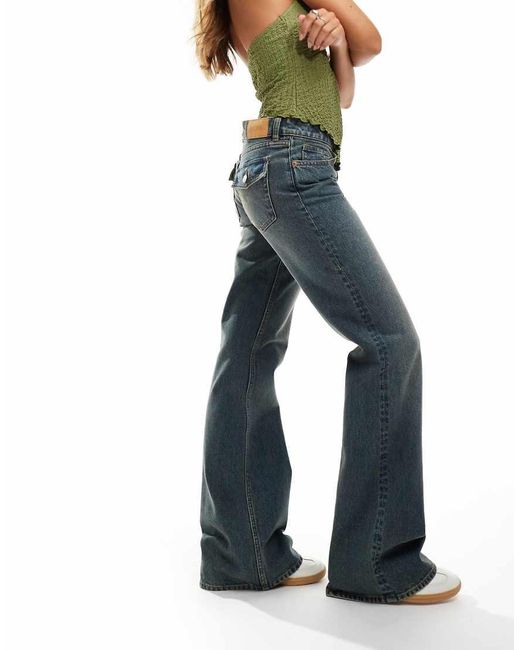 Monki Trudy Low Waisted Flared Jeans in Blue | Lyst UK