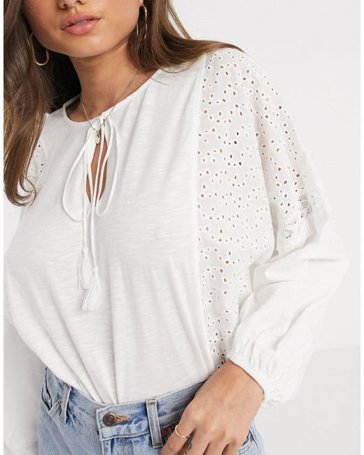 white batwing blouse