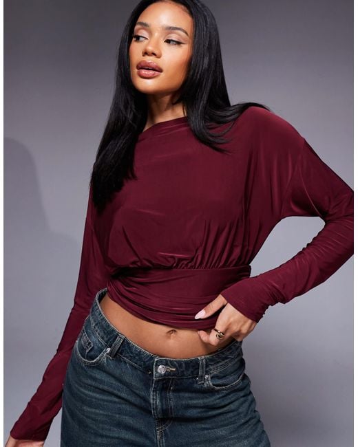 Top asymétrique près du corps à manches longues et taille cintrée - bordeaux ASOS en coloris Purple