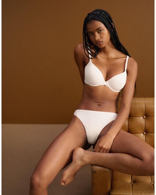 Perfectly fit - string Calvin Klein en coloris Brown