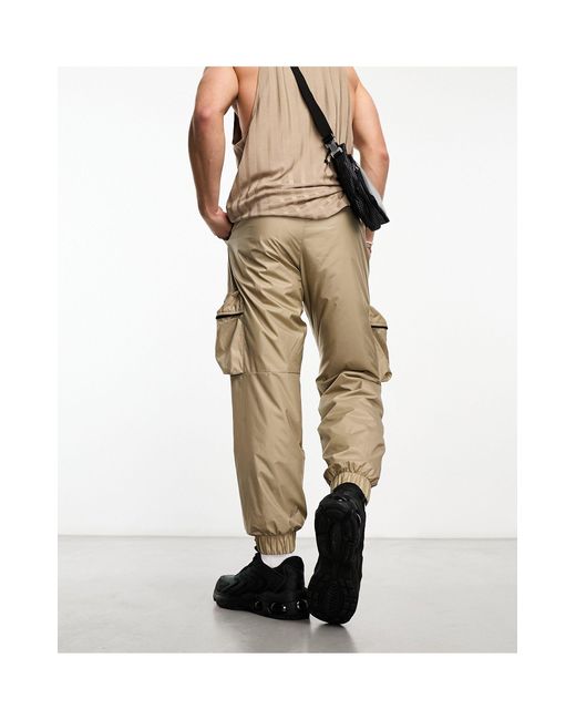 Pantalon cargo technique tissé doublé - kaki Nike pour homme en coloris Natural