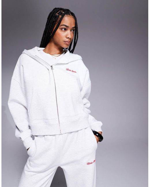 Studio - sweat à capuche zippé court d'ensemble en coton majoritaire à imprimé cerise au dos - chiné et rouge Kaiia en coloris Gray