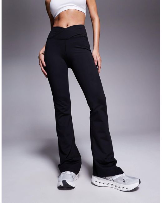 Asos - legging ajusté et évasé à ceinture croisée en tissu doux 4505 en coloris Blue