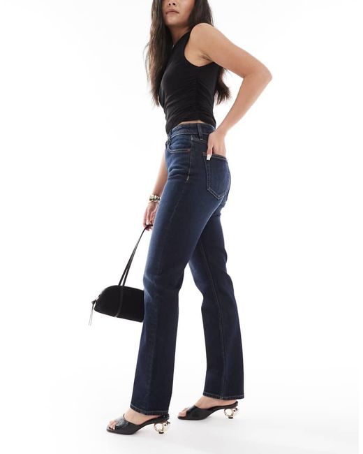 Jeans Dritti A Vita Alta Color Indaco di Calvin Klein in Blue