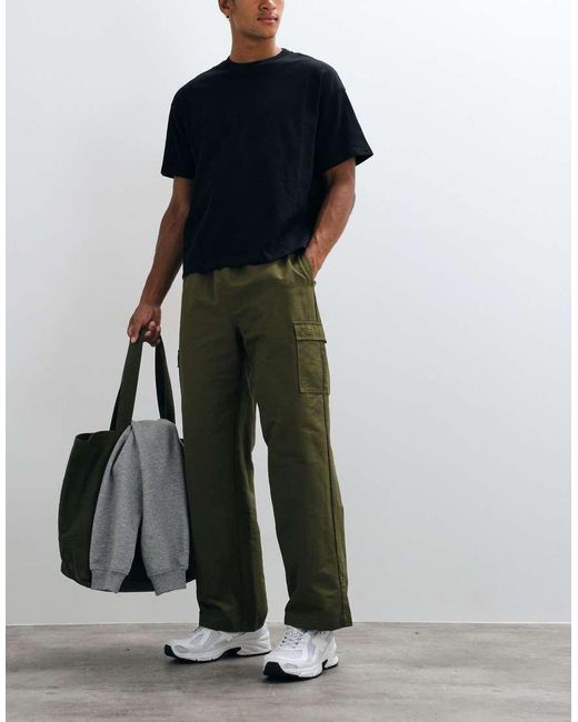 New Balance Green Woven Cargo Pant for men