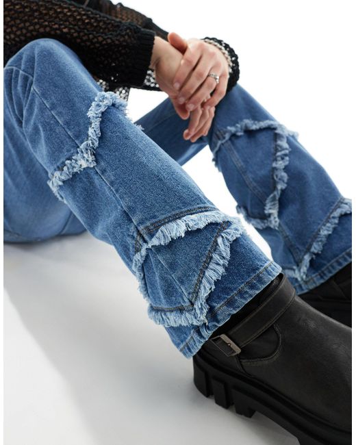 Jeans a zampa medio con bordi grezzi di ASOS in Blue da Uomo