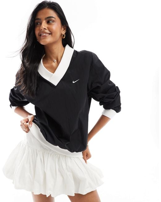 Nike woven crewneck hotsell
