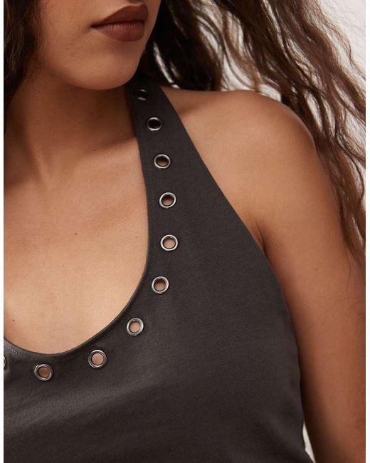 Top Allacciato Al Collo Sbiadito Con Occhielli di Weekday in Black