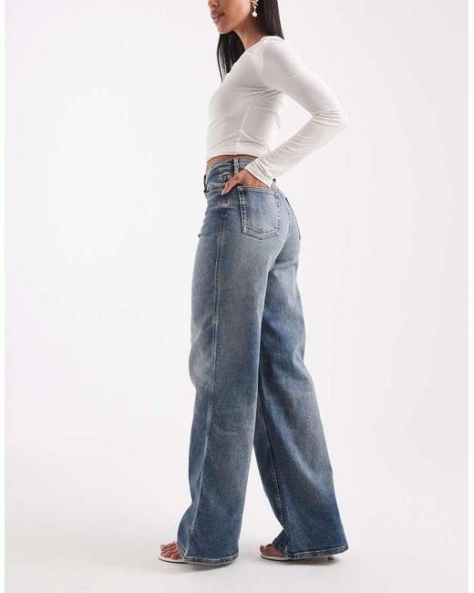 Tommy Hilfiger Blue Charlie High Rise Wide Leg Jeans With Embroidered Logo