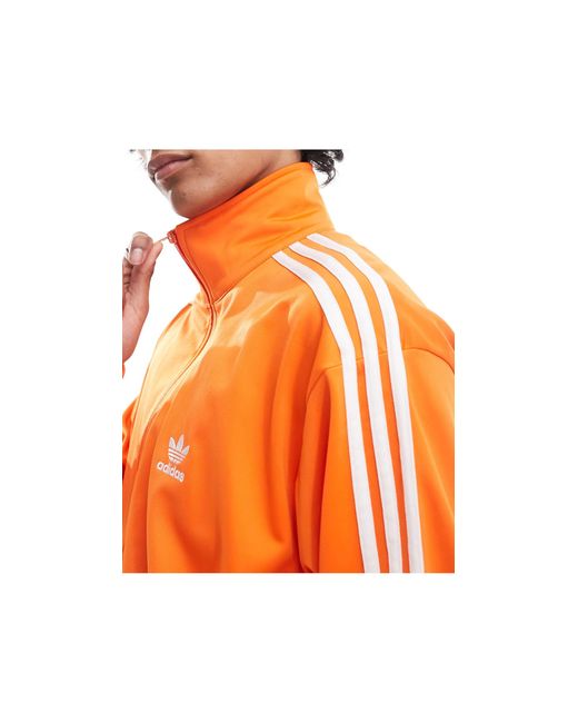 Firebird - giacca sportiva unisex di Adidas Originals in Orange