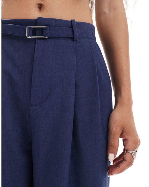Petite - pantaloni a fondo ampio con cintura di Stradivarius in Blue