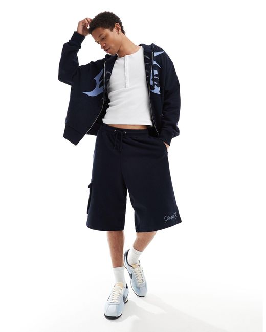 Collusion Blue Navy Skater Shorts With Emblem Long Line Co-ord for men