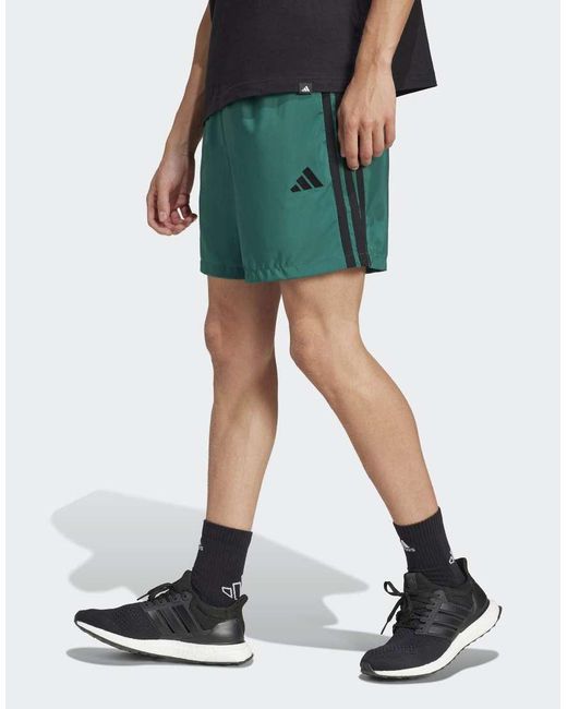 Adidas Originals Green Essentials 3-Stripes Chelsea Shorts for men