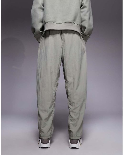 Nike Gray Athletic Club Badge Logo Track Pants for men