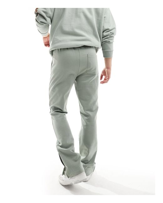 The Couture Club Green Emblem joggers for men