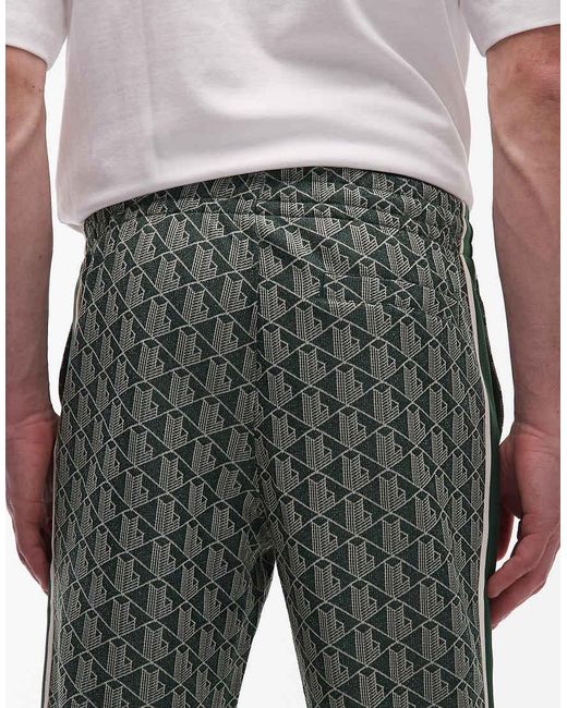 Lacoste White Straight Leg Monogram Track Pants for men