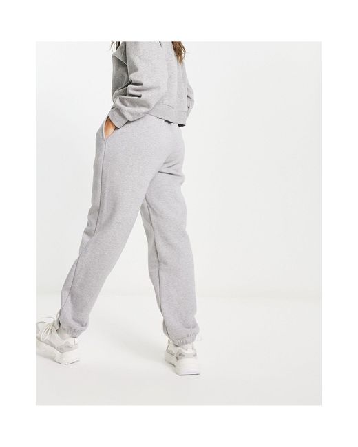 Trefoil essentials - joggers medio di Adidas Originals in White