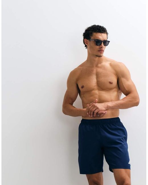 Adidas Originals Blue Adidas Training Essentials Swimshorts With 3 Stripes for men