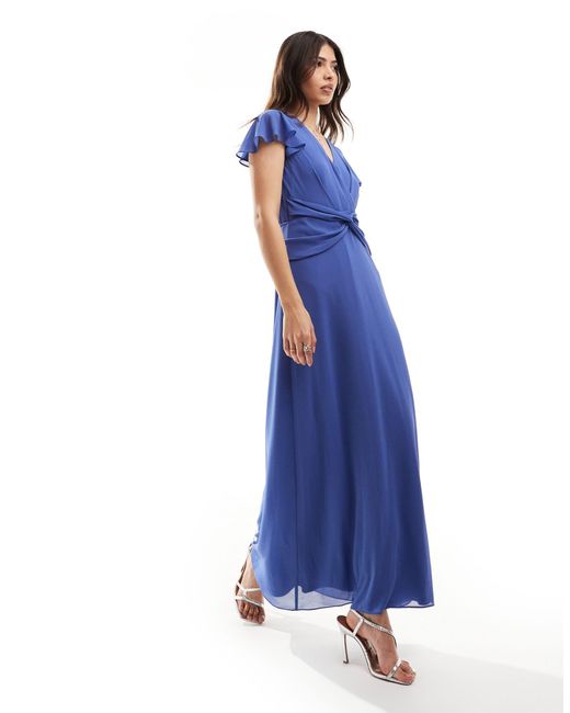 L'invitée - robe longue style cache-cœur - aster TFNC London en coloris Blue