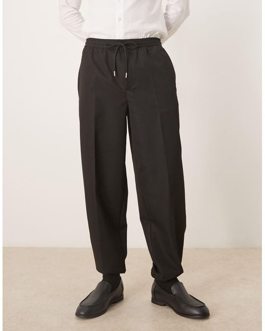 ASOS Black Tapered Fit Trouser With Elasticated Waist And Cuffs for men