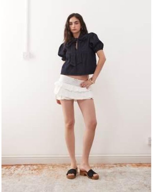 Top en denim à manches bouffantes et encolure nouée - indigo clair délavé Reclaimed (vintage) en coloris Blue