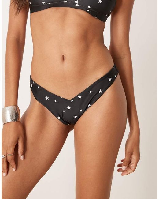 Slip Bikini Neri A V Con Stelle Scintillanti di OOSC in Black