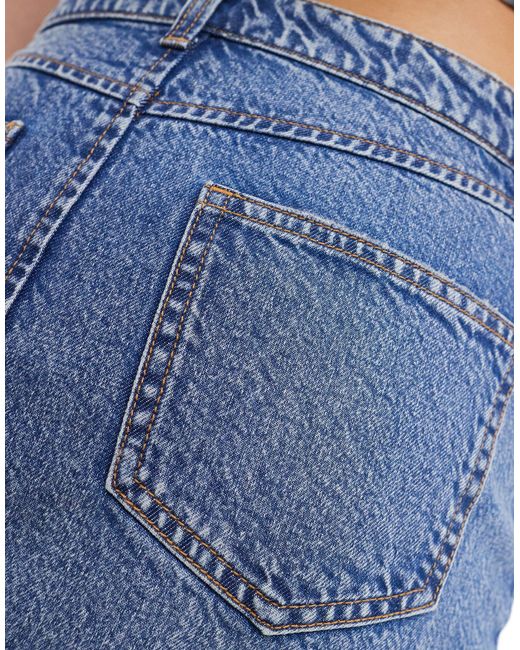 Minigonna di jeans lavaggio medio di Miss Selfridge in Blue