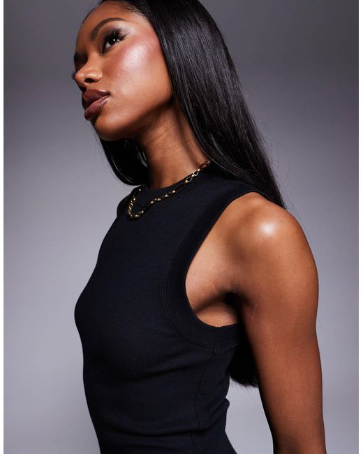 Robe courte côtelée sans manches style années 90 ASOS en coloris Black