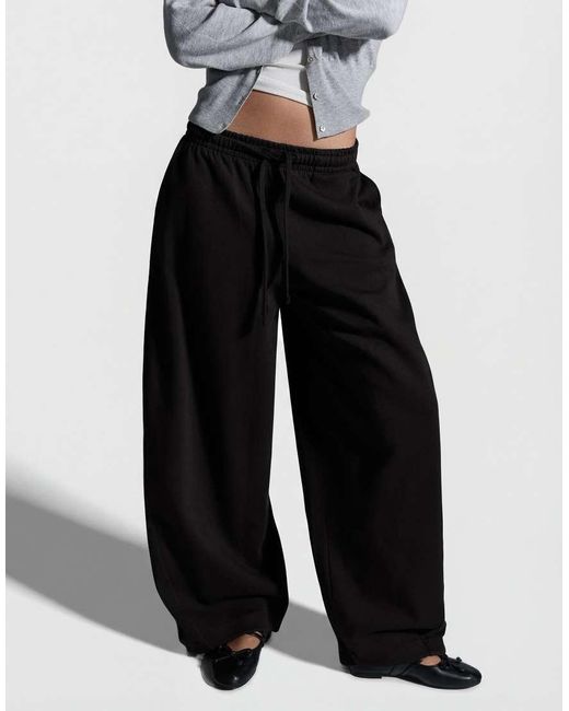 Bershka Black Petite Barrel Plush Trousers With Stoppers