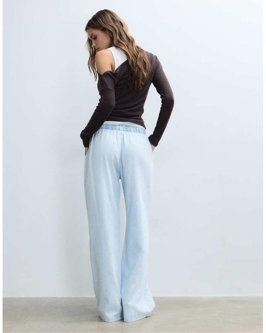 Stradivarius Blue Flowy Denim Trousers With Drawstring