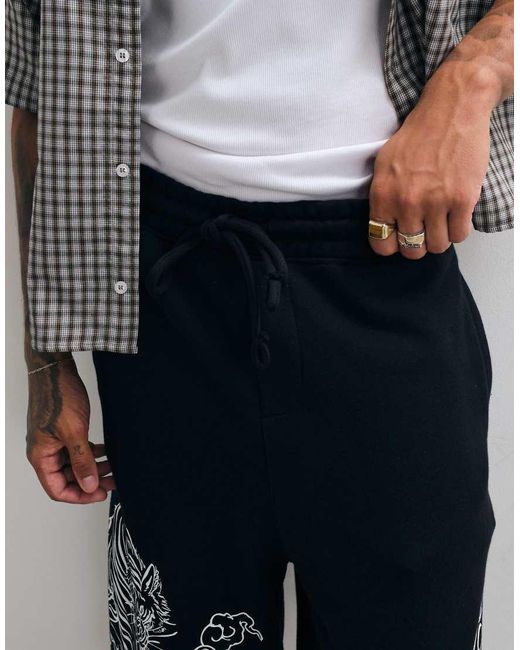 True Religion Black Tiger Graphic Script Loose Fit Fleece Shorts for men