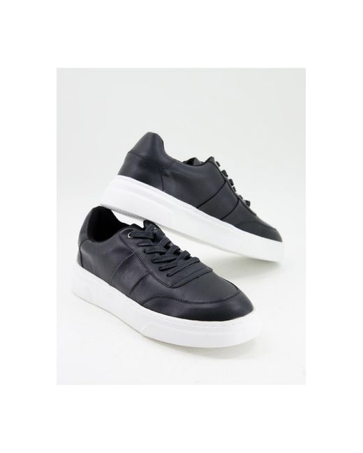 schuh black trainers