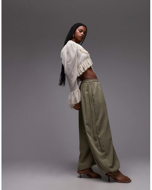 Pantalon ultra ample avec liens noués à la taille - pistache ASOS en coloris Green