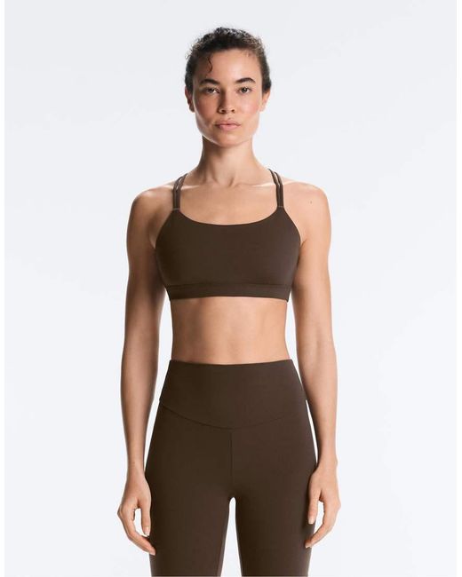Oysho Green Comfortlux Light Support Sports Bra With Crossover Straps