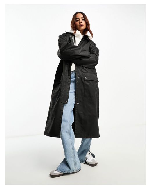 Trench-coat ciré avec doublure à carreaux - noir ASOS en coloris Blue