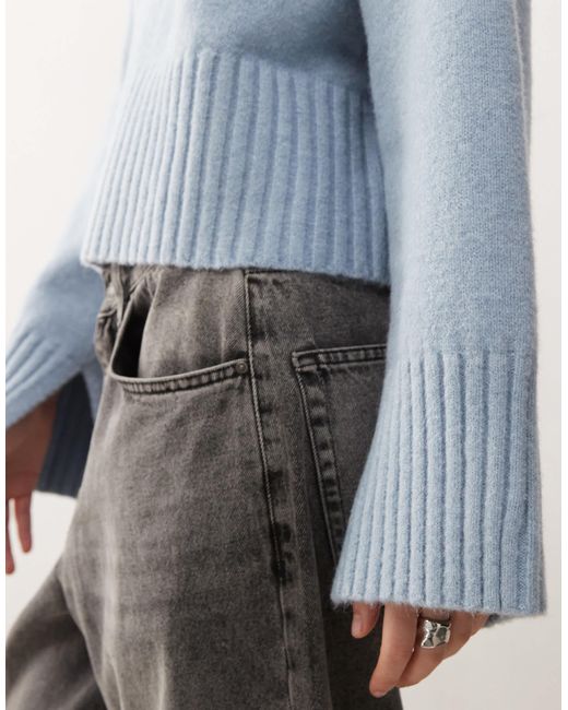 Pull ras Monki en coloris Blue