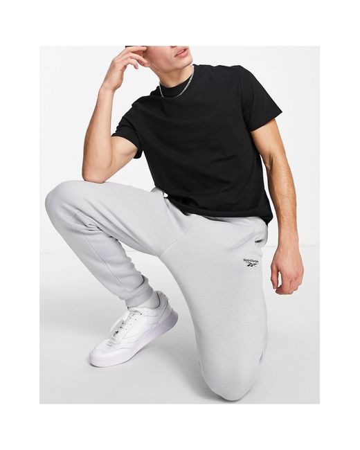 Reebok Small Logo joggers in Gray for 