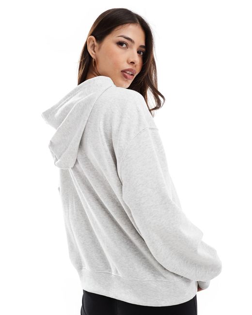 Sport essentials - sweat en tissu éponge New Balance en coloris Gray