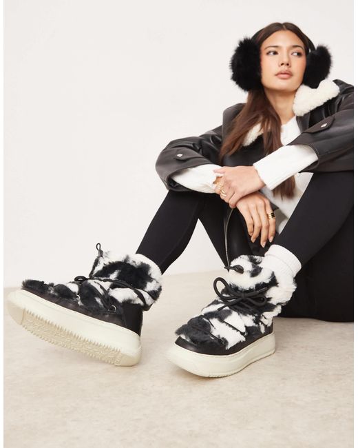 Gravita - après-ski fourrure à motif pied-de-poule Pajar en coloris Black