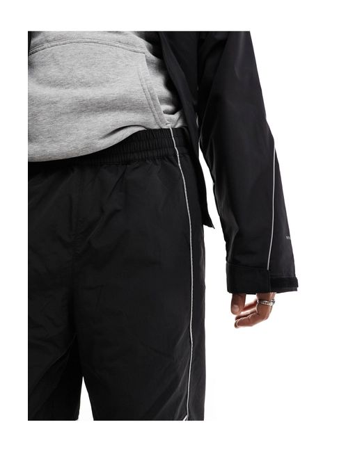 The North Face Black Tek Woven joggers With Reflective Piping for men