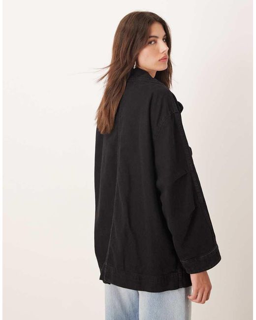 Chaqueta Larga Negra Con Detalle De Bolsillo 100% De Algodón De Mango de color Black