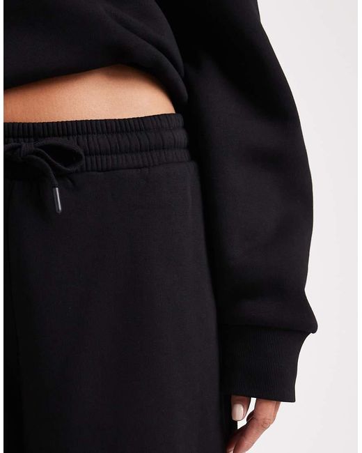 ASOS Black Oversized Brushback Sweatpants With Cuffed Hems Detail