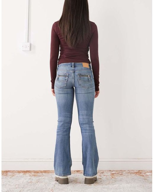 Monki Blue Back Pocket Detail Flared Jeans