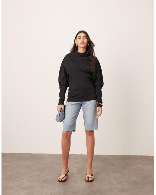 ARRANGE Black Sculptural Jersey Longline Top
