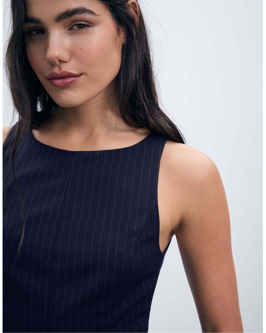 Top sans manches rayé à basque Stradivarius en coloris Blue