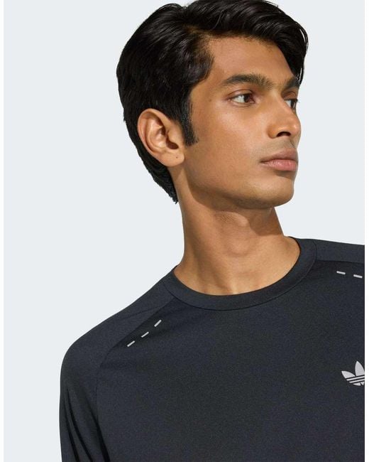 Adidas Originals Blue Tech Trefoil Essentials Poly Long Sleeve Jersey for men