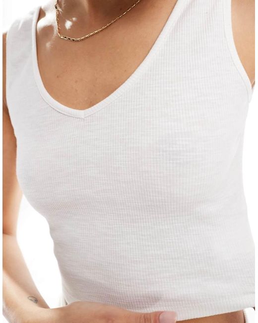 agon® White V Neck Crop Top
