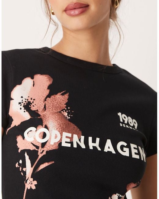ASOS Black Baby Tee With Copenhagen Bleach Flower Graphic