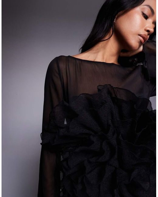 Vestido Largo De Manga Larga Con Volante Extragrande En Forma De Flor En El Cuerpo De Tejido Transparente De ASOS de color Gray