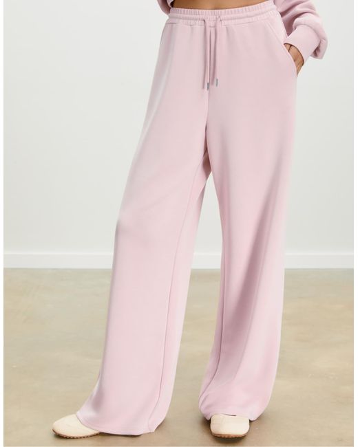 Pantalon palazzo doux - bubblegum Stradivarius en coloris Pink